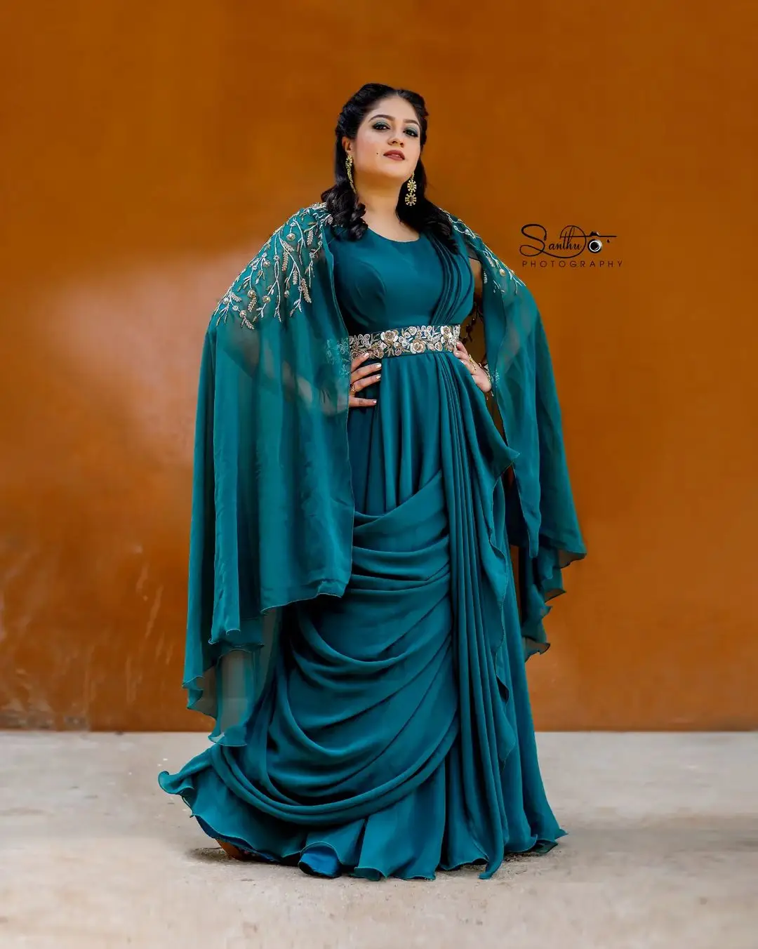 Meghana Raj Wearing Beautiful Earring Blue Gown